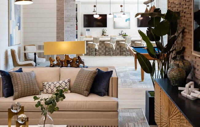 a living room with a couch and a table
