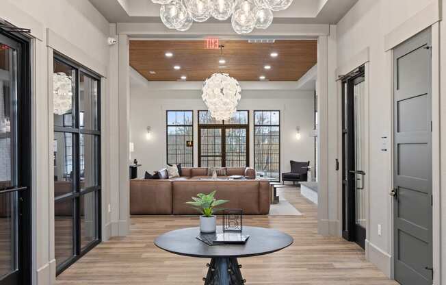 View of a living room with couches and a table at Hadley Place Apartments, Pennsylvania