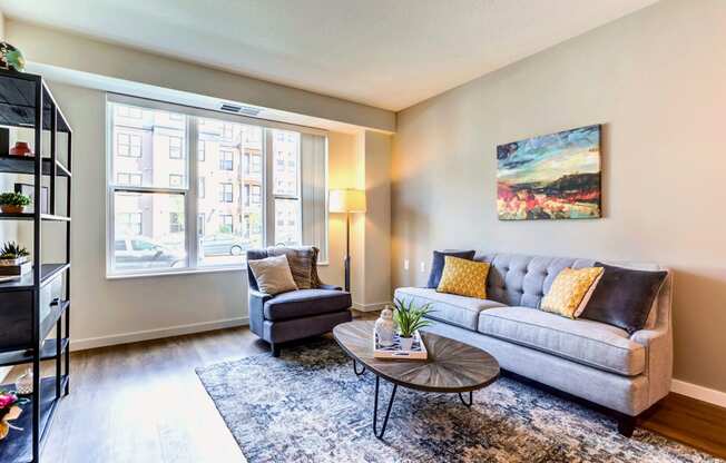 Living Room With Large Window at The Legends at Berry 62+ Apartments, St. Paul, 55114