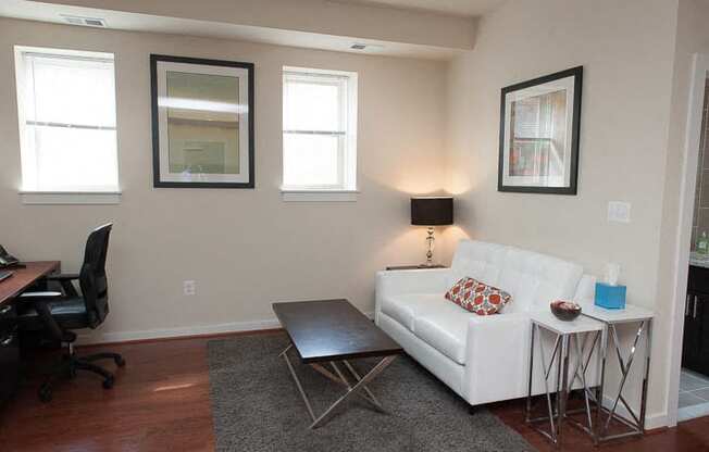 a living room with a couch and a table