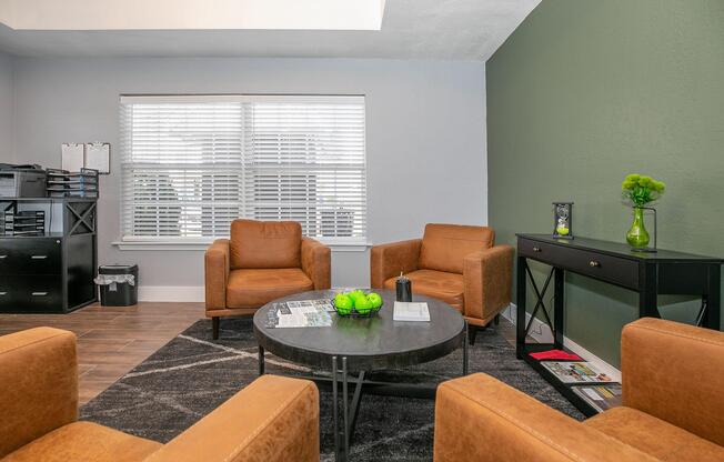 a living room filled with furniture and a table