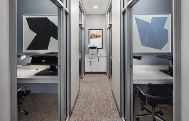 a conference room with a desk and a door