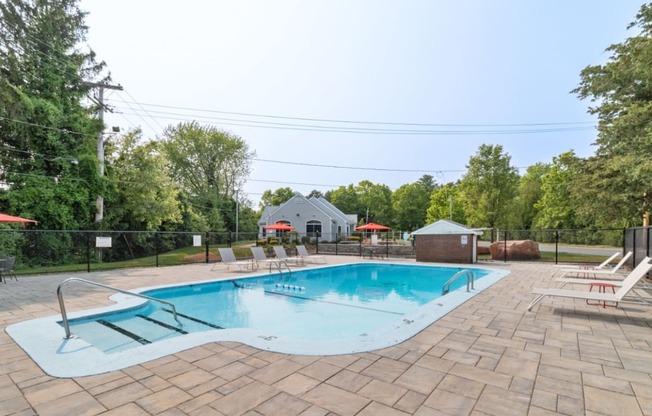 Outdoor swimming pool at Mansfield Meadows Apartments in Mansfield, MA.