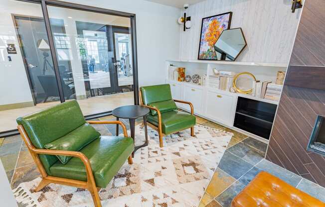 resident lounge with lounge chairs at Bayswater Apartments, Burlingame