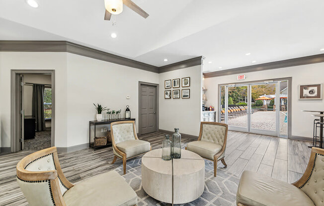 Community Clubhouse with Lounge Furniture at Lake Cameron Apartments located in Apex, NC.