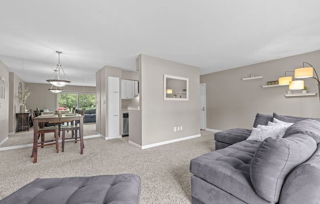 a living room with a couch and a chair
