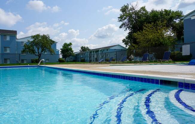 Swimming Pool entry with Pool chairs, at Gale Gardens Apartments