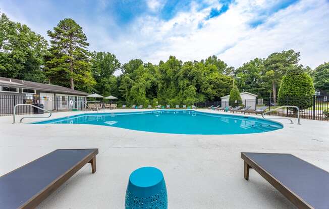 the swimming pool at woodland park apartments