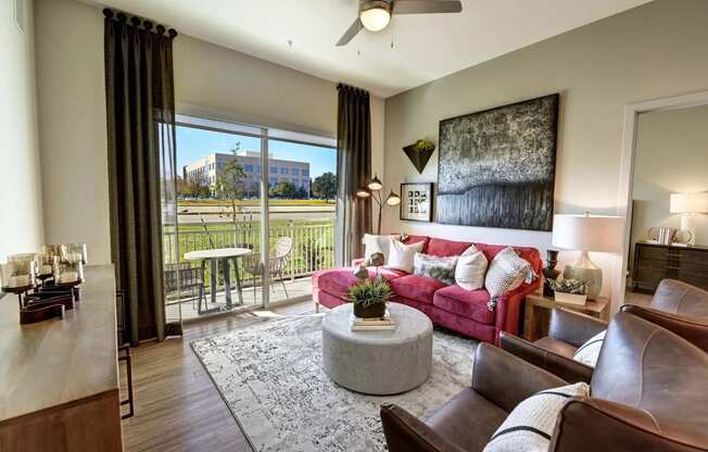 Decorated living room at Windsor Preston, 7950 Preston Road, Plano