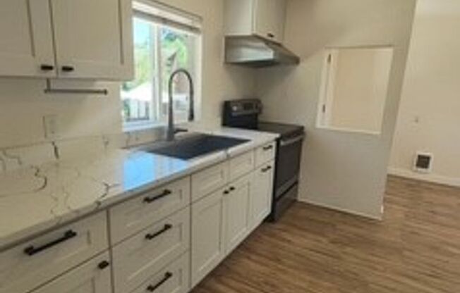 Adorable 2 Bedroom 1 Bath Single Story House with a Garage