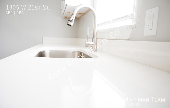 1305 W 21 ST