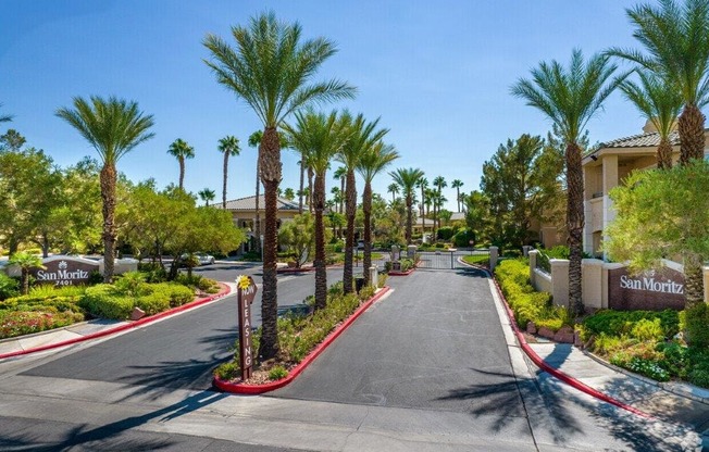 Gated Community with Lush Palm Trees at San Moritz Apartments, Nevada