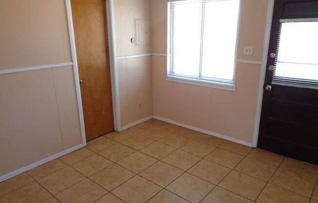 Cute Single Level Northeast Home With Refrigerated Air Located In Quiet Neighborhood