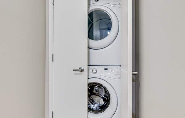 Closet Featuring Stackable Washer & Dryer