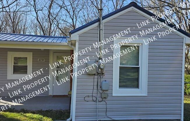 Completely Remodeled 2 Bedroom with a Huge Back deck and fence near 153 and bonus room.