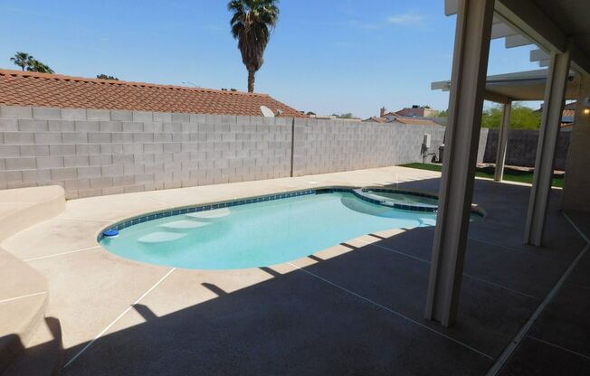 GORGEOUS SINGLE STORY WITH MANY UPGRADES*3 BEDROOMS*SPARKLING POOL AND SPA!