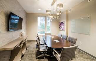 Interactive Social Space with USB Charging Stations and Television at Quarry at River North