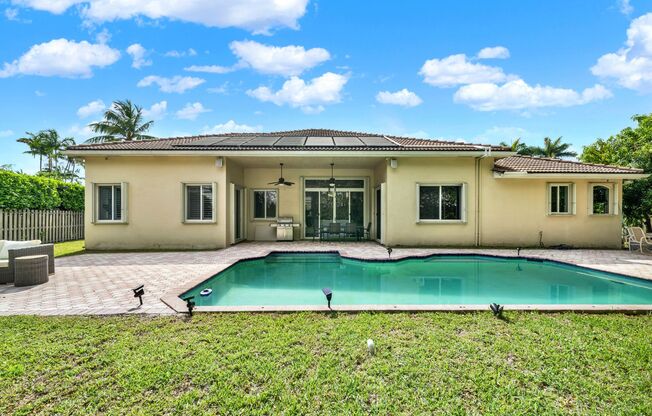 Elegant 4-Bedroom Pool Home in Exclusive Gated Community