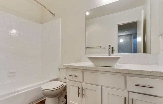Bathroom with white interior at Meridian Apartments, Los Angeles, CA