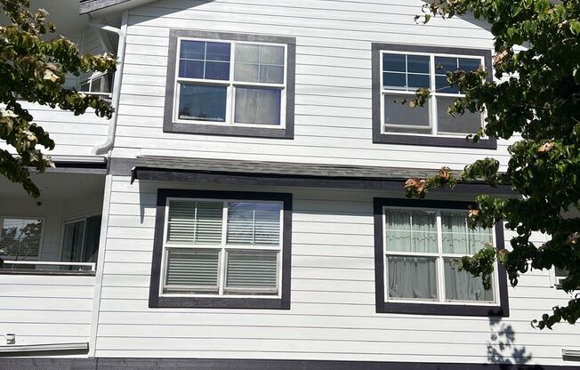 Vaulted Ceilings, Fireplace, LVP Flooring, TOP FLOOR! 2 Bedrooms, 2 Baths & Parking…