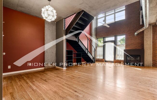 Modern Industrial Condo Downtown with Parking!