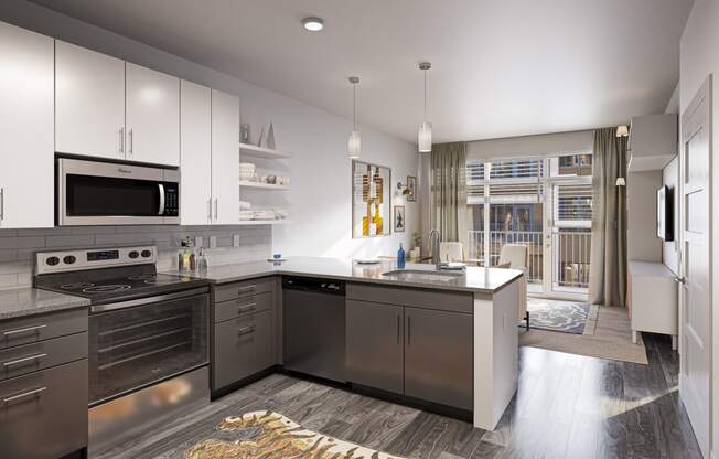 a kitchen with stainless steel appliances and a counter top at Link Apartments® Broad Ave, Memphis, 38112