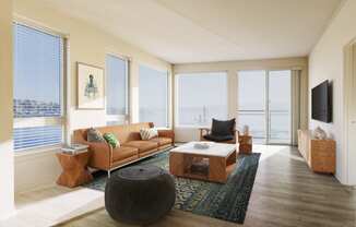 a living room with a couch coffee table and a tv at Marina Square, Bremerton, WA, 98337