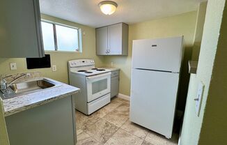 Renovated 1-bedroom attached studio with private entrace, ready for immedate move-in.