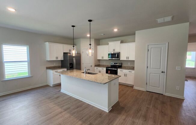 Spacious 4BR Home with Open Floor Plan & Backyard