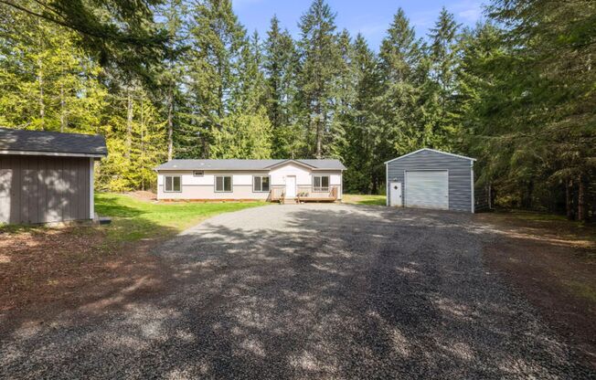 Peaceful Forest Retreat with Detached Garage in Poulsbo
