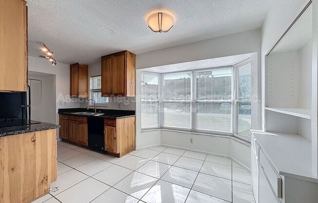 9893 47 AVE N