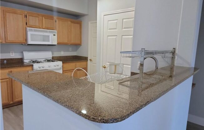 SOUTHWEST GATED 2-BED, 2-BATH FIRST-FLOOR UNIT!