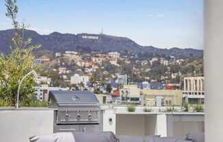 a view of the hollywood sign from a roof terrace