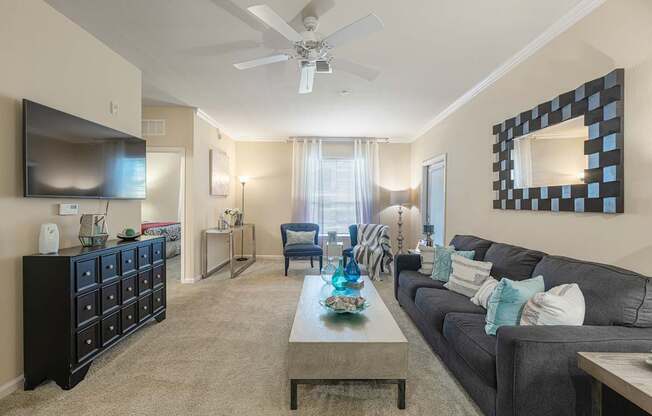 a living room with a couch and a coffee table