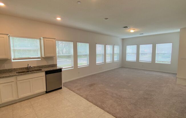 3 Bedroom, 2.5 Bath End Unit Townhome in Bay Lake Preserve with One Car Garage!