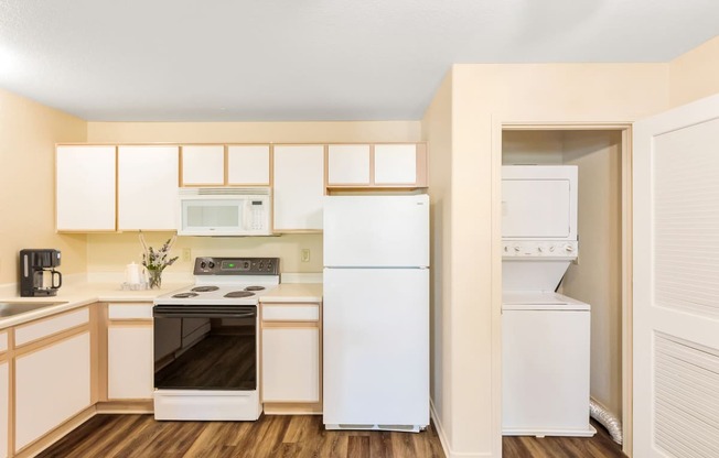 the preserve at ballantyne commons apartment kitchen with white appliances