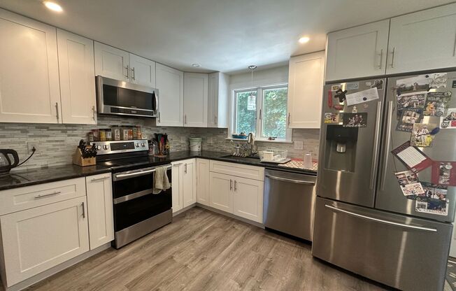 Spacious Single-Family Home for Rent - Laundry, Parking, Private Deck