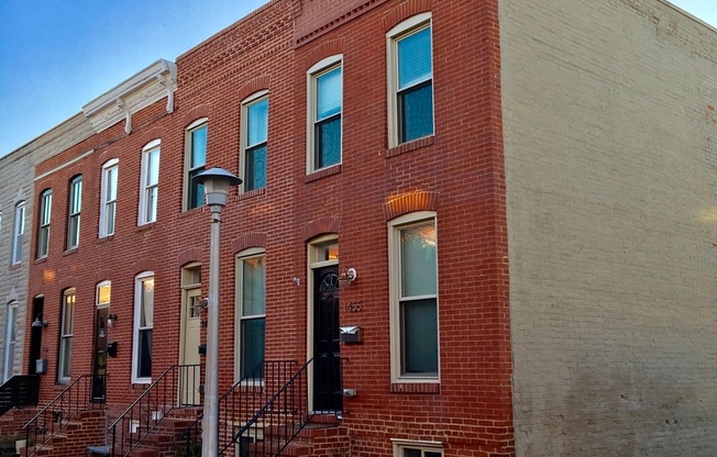 Charming 2 Bedroom/3 Bathroom Townhome w/ Den and In-Unit Laundry in Locust Point, MD! - Parking Pad!
