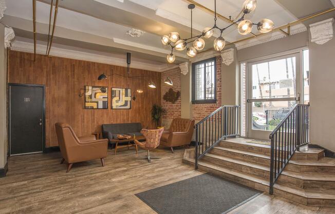 a living room filled with furniture and a fireplace