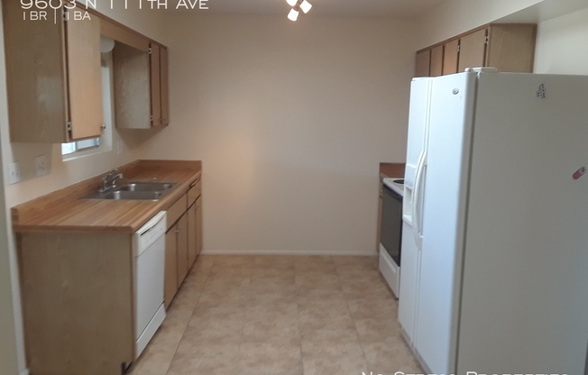 9603 N 111 AVE