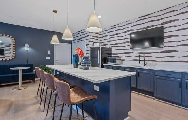 a bar with a table and chairs in a room