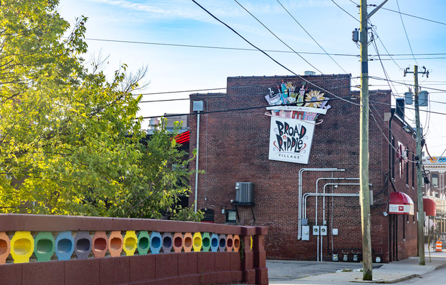 a brick building with a sign on the side of it