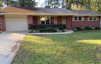 Charming 3-Bedroom Red Brick Home with Modern Upgrades and Fenced Back Yard Near Lake Jackson!