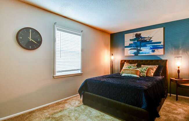 Bedroom in a 1-bed, 1-bath apartment at Ashton Brook, featuring natural light and ample space for furniture.
