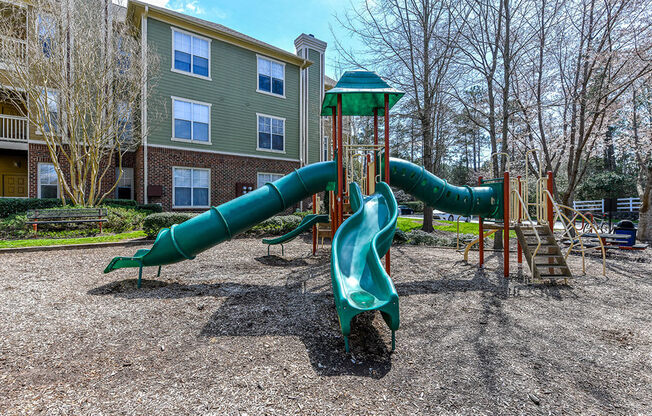 Playground at Alden Place too! Slides, Climbing Equipment and Bike Parking at Alden Place at South Square Apartments, Durham, NC 27707