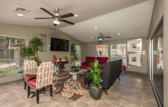 a living room filled with furniture and a fire place