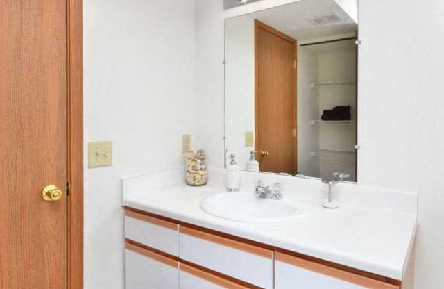 Renovated Bathrooms With Quartz Counters at Ross Estates Apartments, MRD Conventional, Lawton, OK, 73505