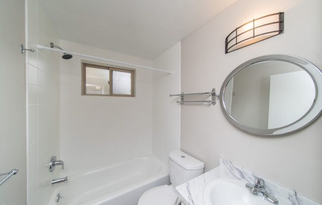 Renovated bathroom with granite countertop