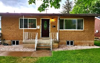 Beautifully updated duplex with parking and a storage shed