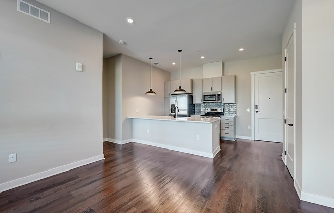 Midpoint Model Living Room to Kitchen